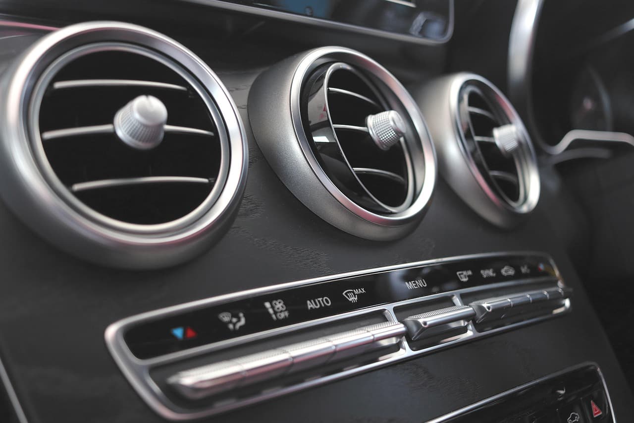 Air vents and climate controls on a car dashboard